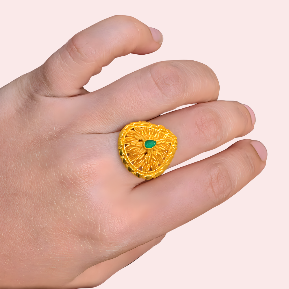 Traditional Sunburst Gold Finish Ring With Green Center Stone - product image 1
